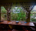 Neon Chandelier over the Dining Room Table